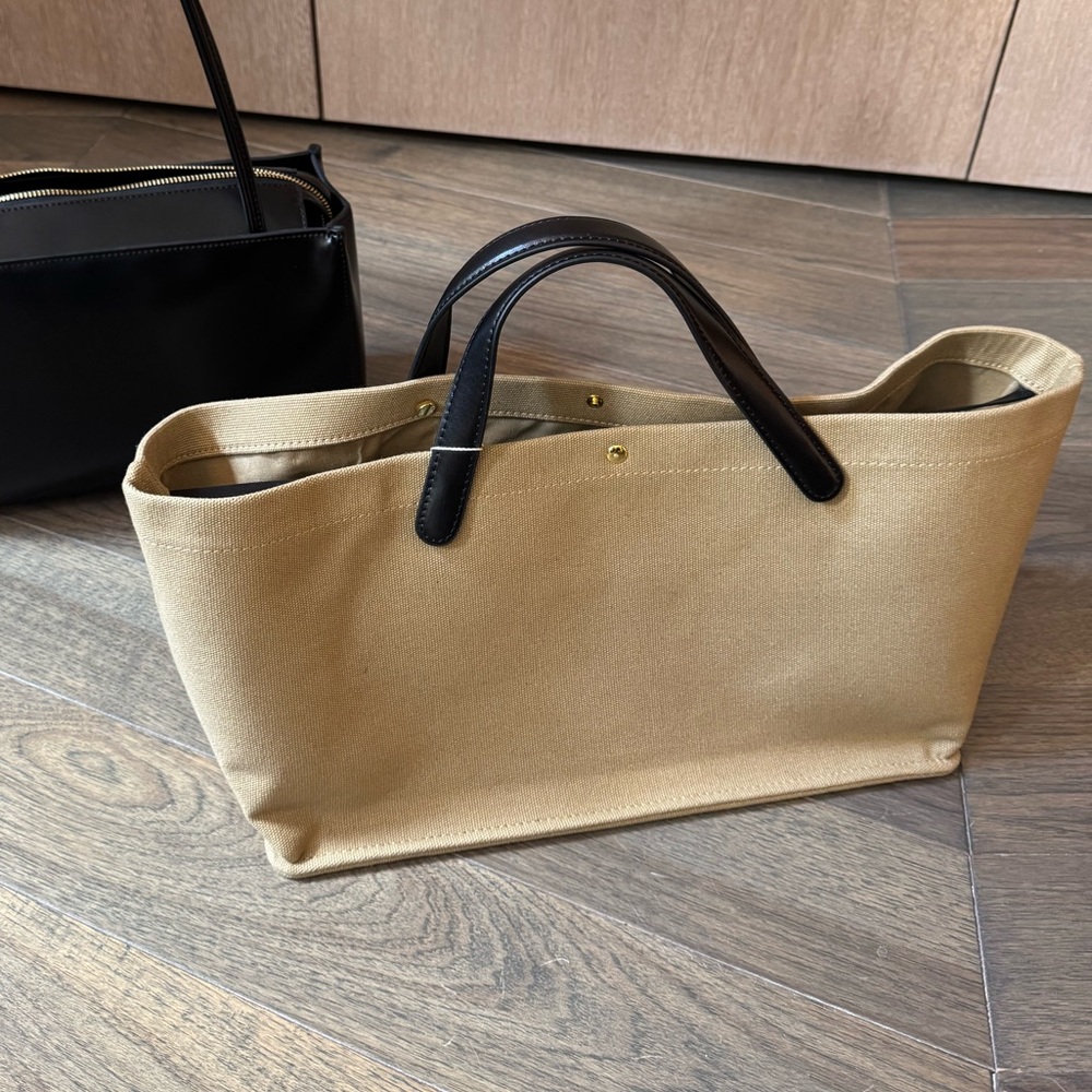 Canvas tote with black leather handles